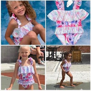 NWOT. Coming Up Roses Swim Suit